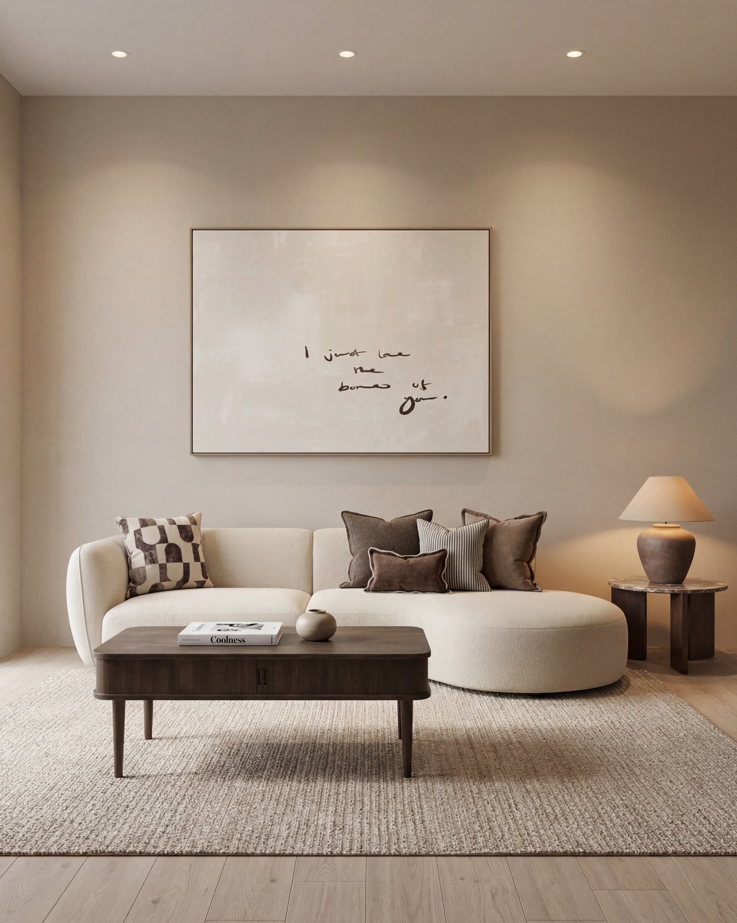 A modern living room featuring a curved sofa with decorative pillows, a wooden coffee table, and a lamp, set against a neutral wall with abstract art.