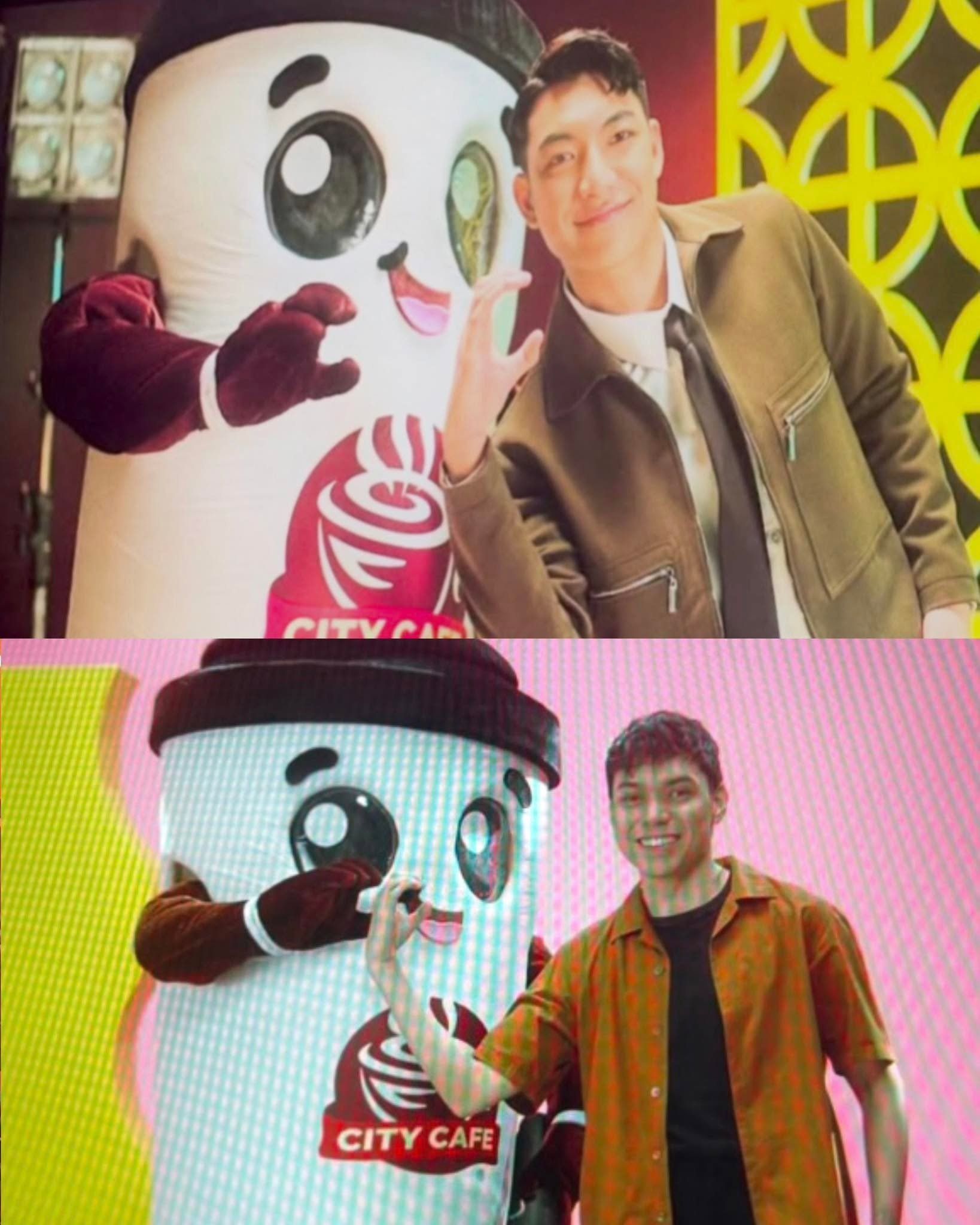 A person poses with a large coffee cup mascot in a colorful setting, showcasing a playful interaction.